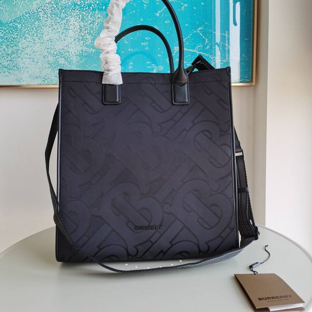 Top version original leather Burberry's spacious tote bag is made of recycled po
