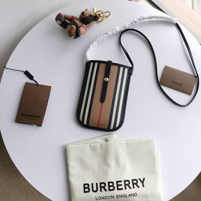 The latest crossbody mobile phone case from Burberry has arrived. Decorated wit