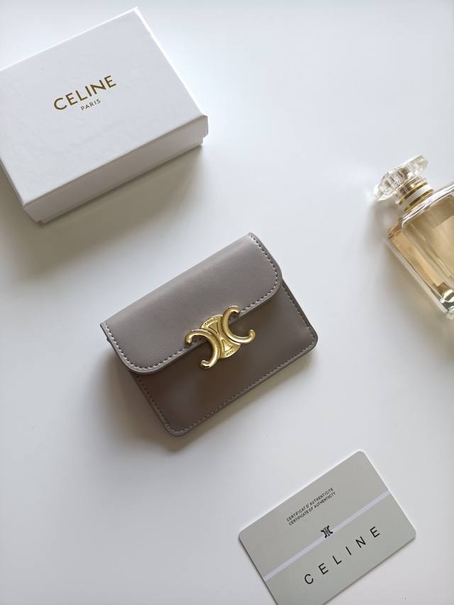 Celine latest Triomphe leather flap card holder, gold finish, snap button closur