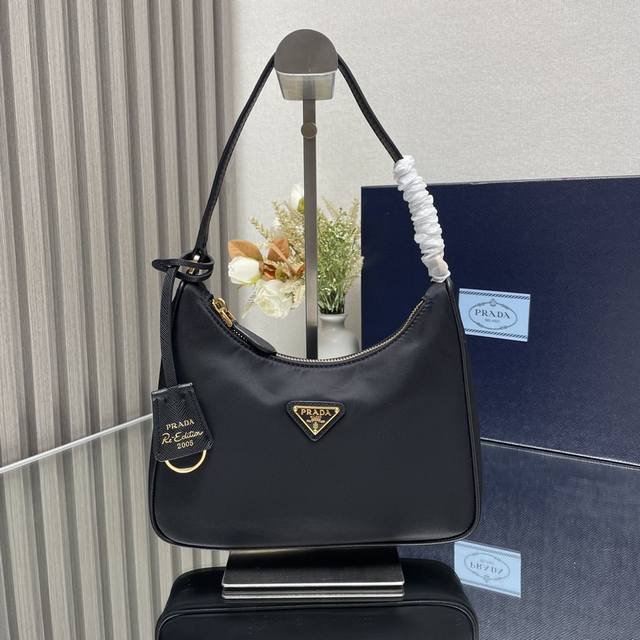 Top original Prada latest hot-selling leather shoulder strap gold hardware Hobo