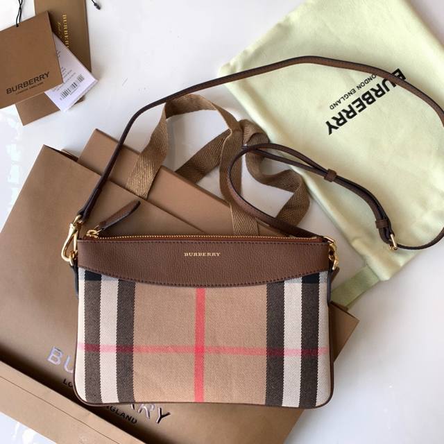 Bur's new House plaid leather crossbody bag clutch is made of British finely spu