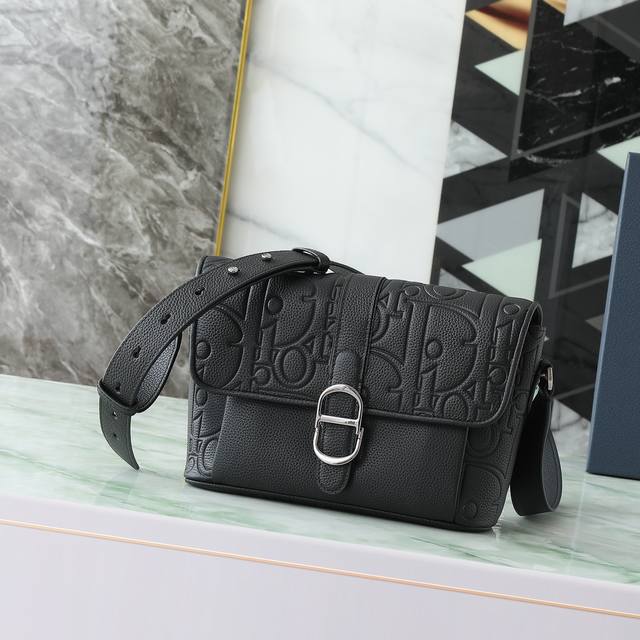 New to the Fall 2025 Men's Collection, this Dior Daily flap messenger bag showc