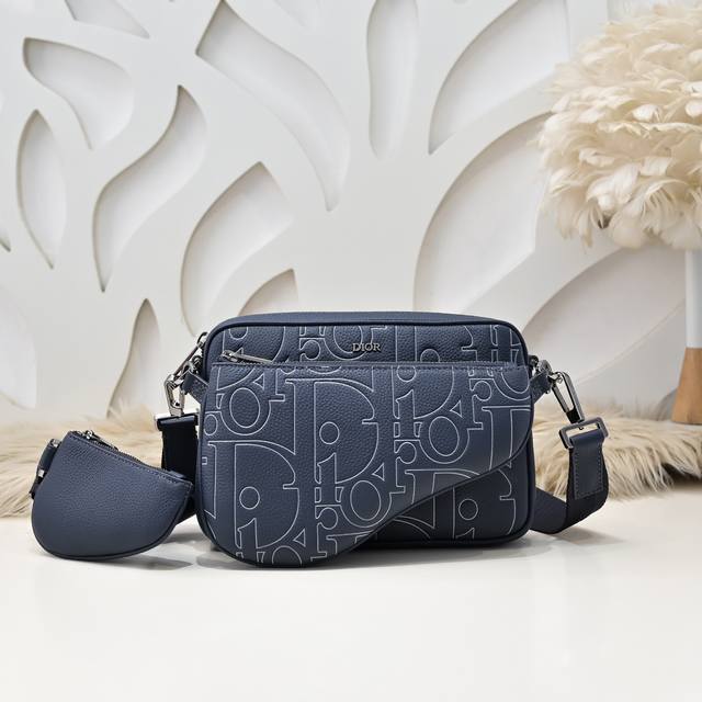 Dior- The latest crossbody bag from Dior counters. The three-piece saddle bag se