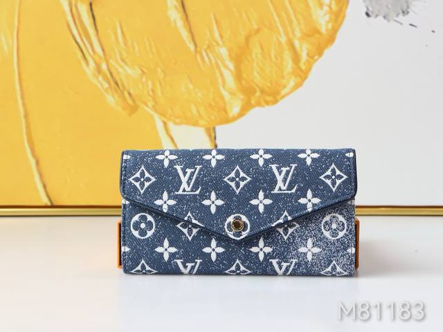 Color Blue Cloth Size 19X10M81183 This Sarah wallet is reinterpreted in Monogra