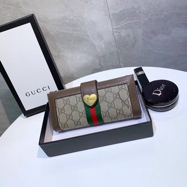 Color: Coffee Size: 19X10 Gucci's popular cowhide with PVC bi-fold wallet Class