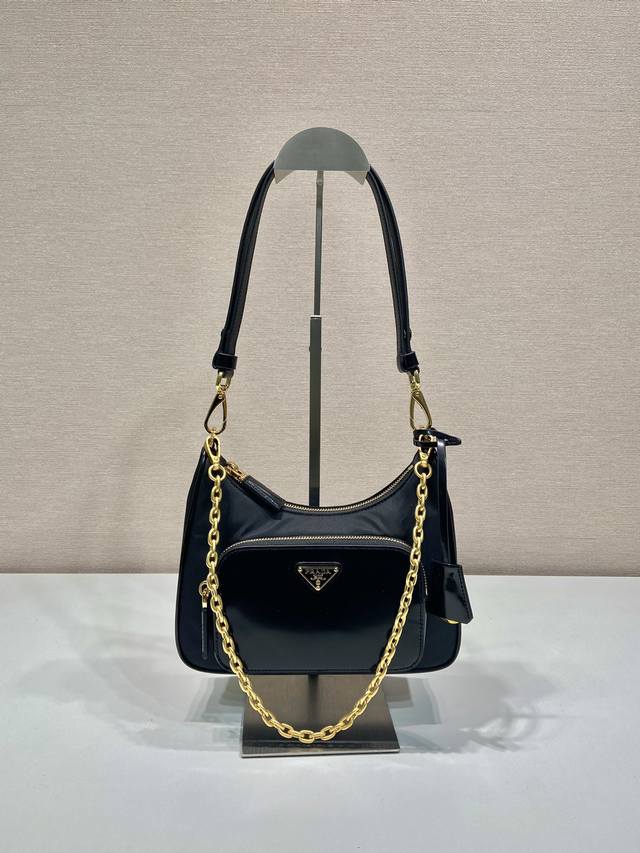 New Underarm Bag 1Bc198, Nylon with Shiny Leather This simple handbag is made o