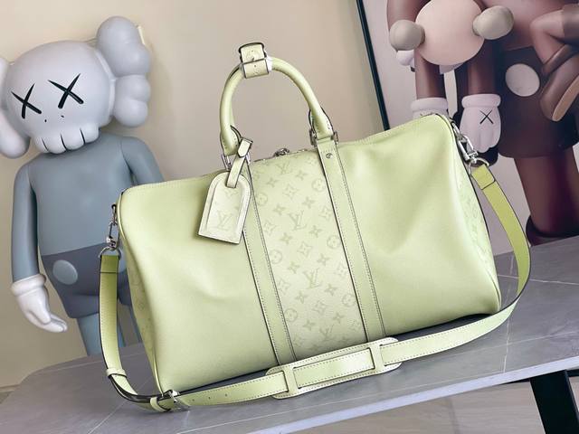 Louis Vuitton's classic Keepall 45 size travel bag, model number 14124, is dyed