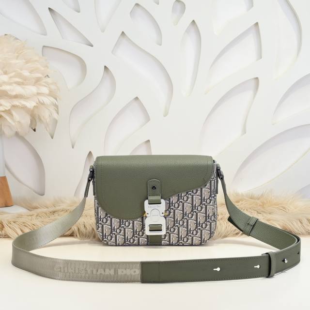 Dior - Dior's latest messenger bag crossbody bag. Available in khaki color on th