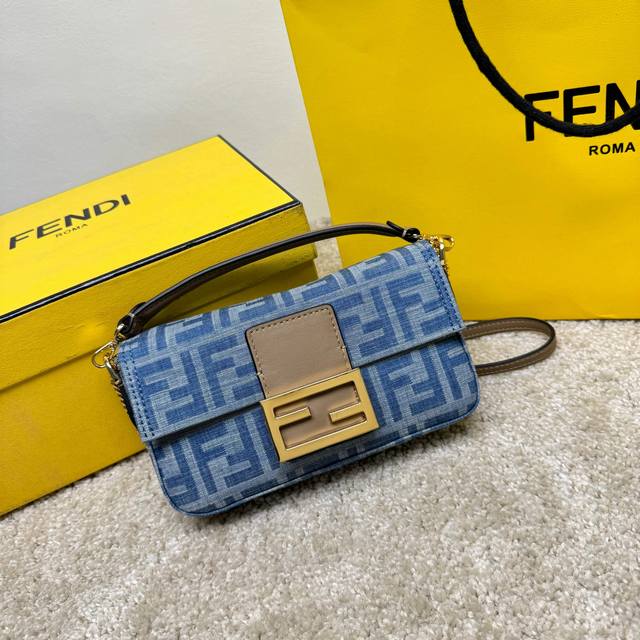 Small size signature Baguette in light blue denim with Ff motif, trimmed in beig