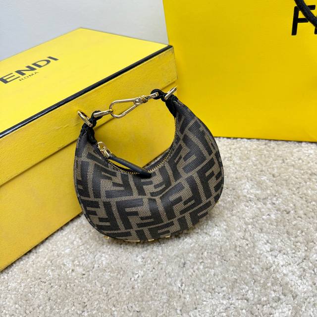 Fendigraphy Nano version of the crescent bag, zipper closure, decorated with Fen