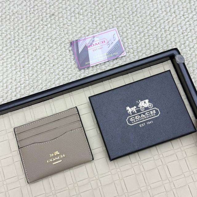 Super mini card holder Coach new logo card holder, made of first layer cowhide,