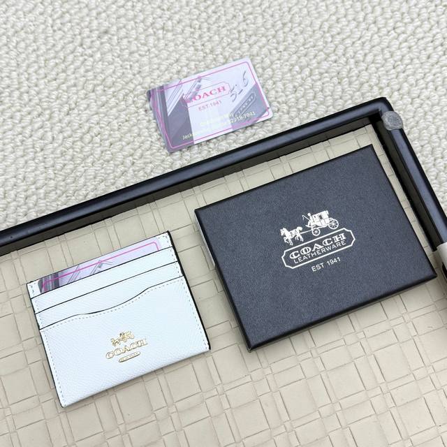 Super mini card holder Coach new logo card holder, made of first layer cowhide,