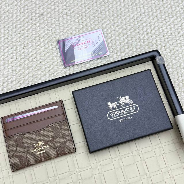 Super mini card holder Coach new logo card holder, made of first layer cowhide,