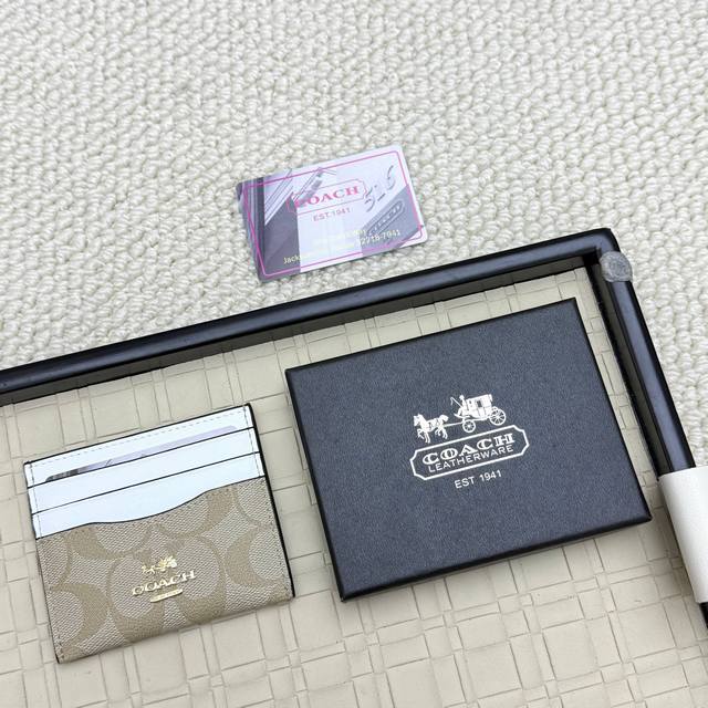 Super mini card holder Coach new logo card holder, made of first layer cowhide,