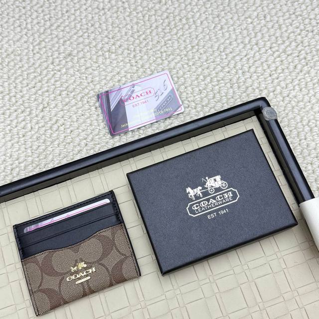 Super mini card holder Coach new logo card holder, made of first layer cowhide,