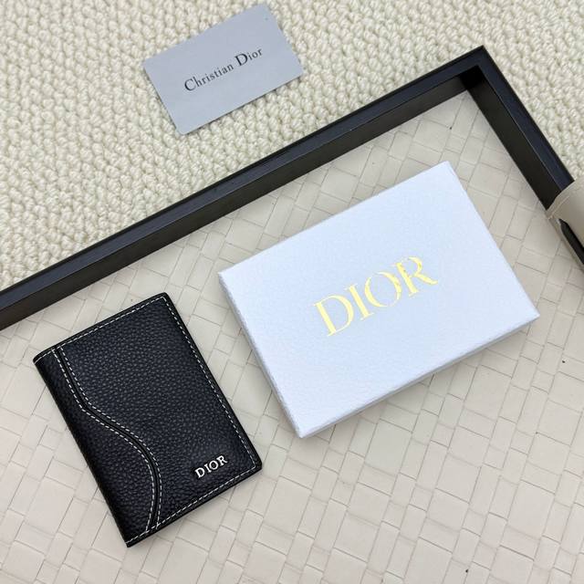 Dior's new bifold cardholder is an elegant accessory that showcases Dior's exqui