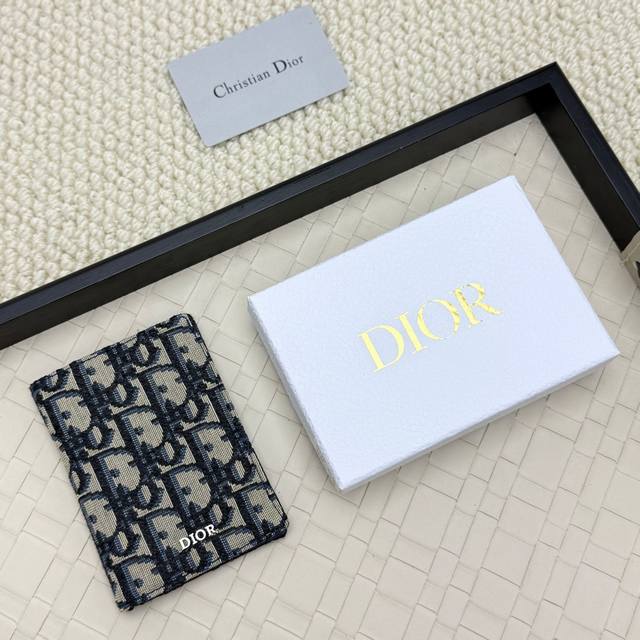 Dior's new bifold cardholder is an elegant accessory that showcases Dior's exqui