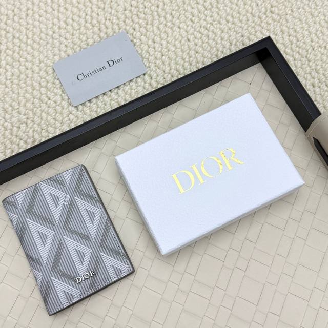 Dior's new bifold cardholder is an elegant accessory that showcases Dior's exqui