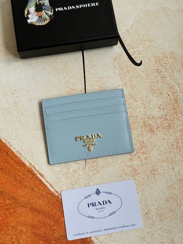 Prada classic women's card holder, model 1Mc025, with triangle wheat stitching,