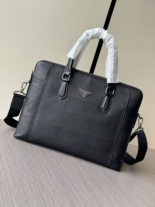 The latest and hottest Prada double zipper briefcase from the top counter mouse