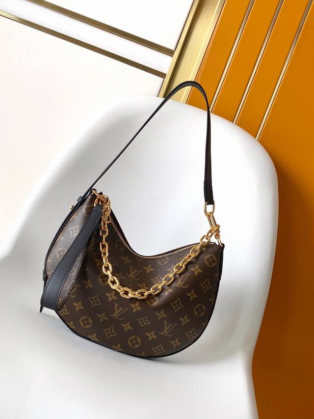 M15056 Top Original Dynamic 163 The Cookie Bb bag is made of Monogram coated can