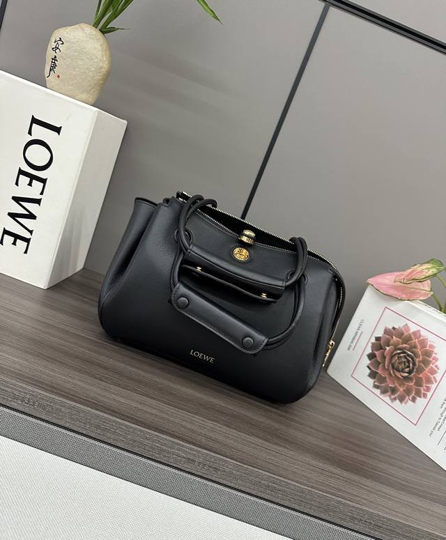 Rogers new small soft cow leather Madrid handbag The Madrid has a soft structure