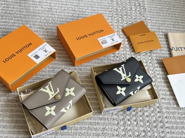 cowhide with boxL's new monogram wallet! Do you dare to say you can resist its a