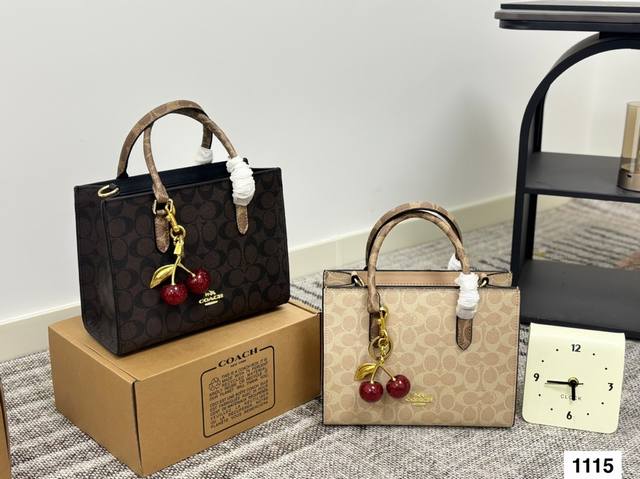 with box Coach tote I love it! Light color will make it more ladylike and roman