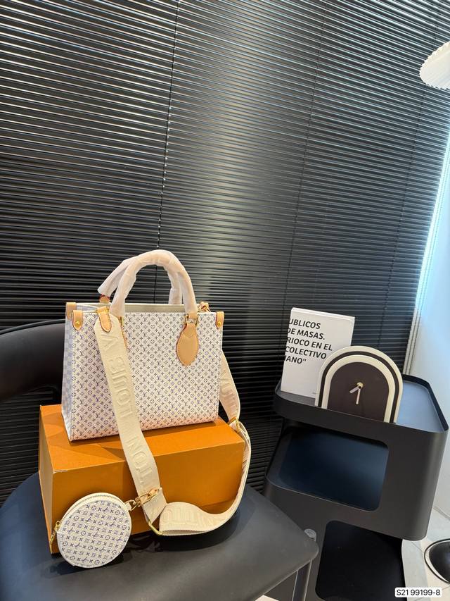 with folding box Lv tote with wide shoulder straps and small coin purse size is
