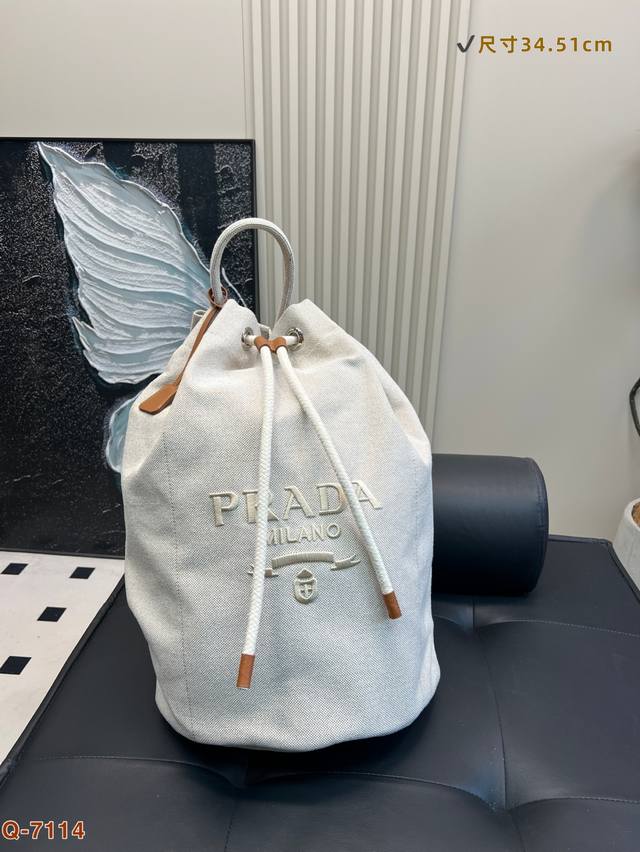 Prada's high-value drawstring bucket bag is a favorite for everyone. The capaci