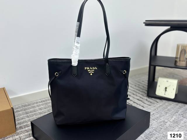 Prada nylon shopping bag is light, durable and has a large capacity. This is a c