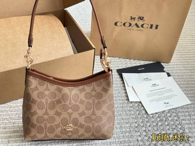 Replica Coach I didn't expect the mini hobo bag to be so cute. The mini hobo bag