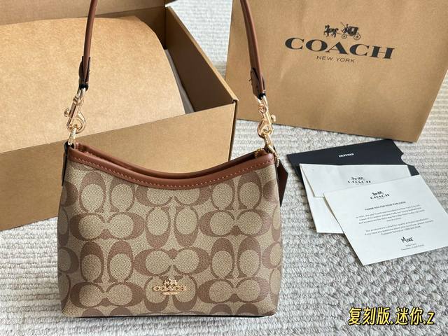 Replica edition Coach I didn't expect the mini hobo bag to be so cute. The mini