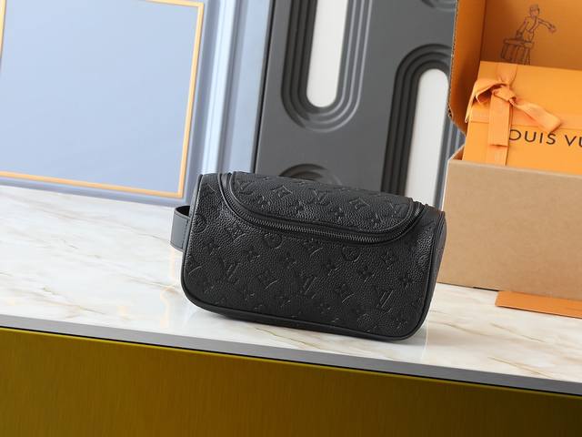 Upgraded original M11510 This vanity bag is made of Damier Graphite canvas, whi