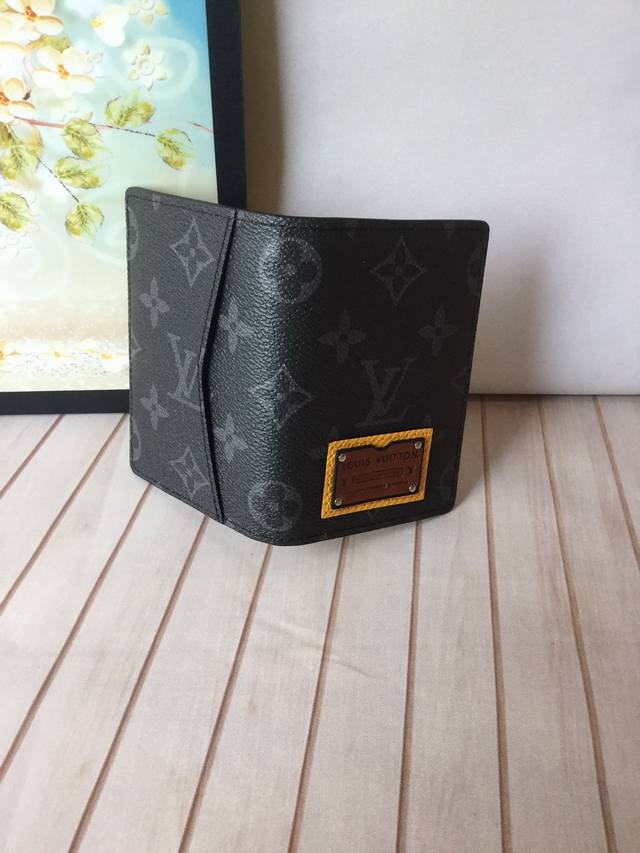 M69250 Black floral card holder with cross liningThe Pocket Organizer wallet is