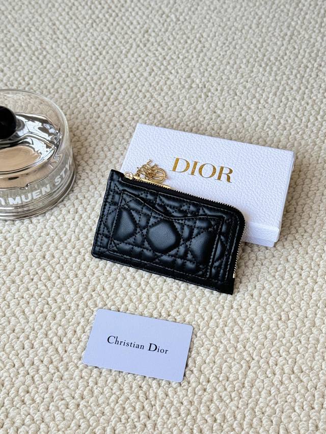 Lady Dior card holder sand color. I bought this wallet to fit my waste bag. It h
