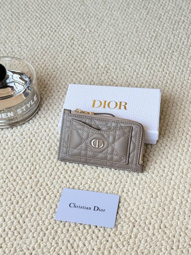 Lady Dior card holder sand color. I bought this wallet to fit my junk bag. It ha