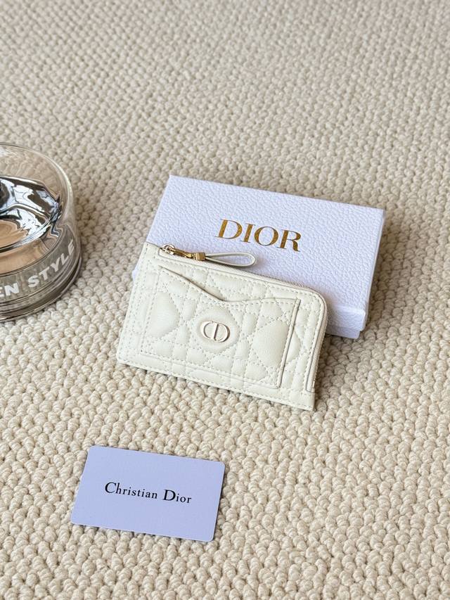Lady Dior card holder sand color. I bought this wallet to fit my waste bag. It h