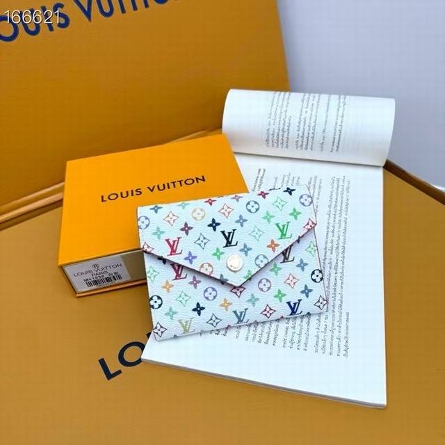 M41938. 33-color style and powerful functions, this small Victorine wallet is th