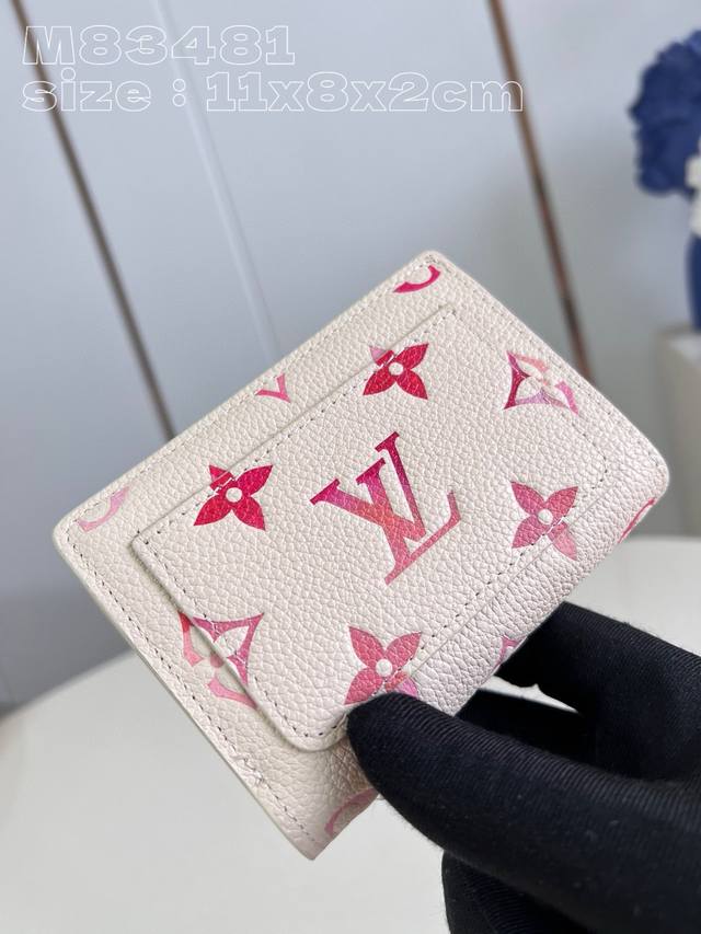 The top original new Lou bifold wallet is made of soft Monogram Empreinte embos