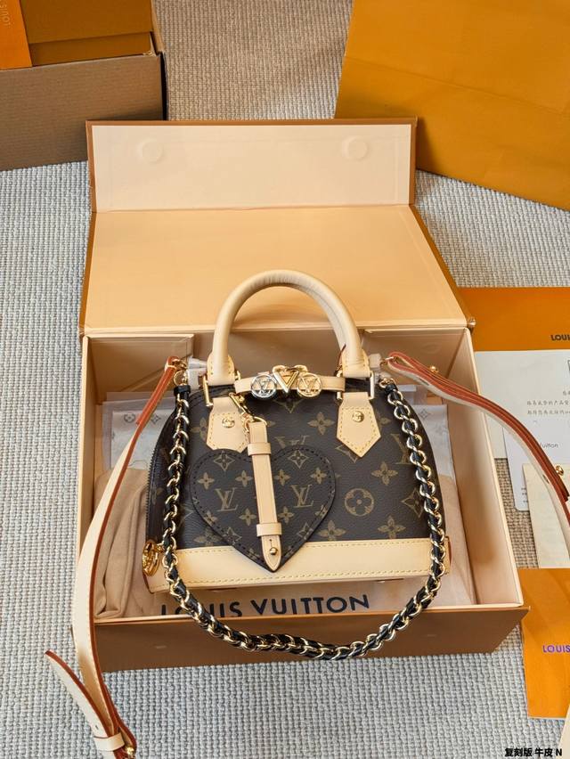 Replica Cowhide Lv Mini Alma Series Cowhide Shell Bag This Retiro handbag is mad