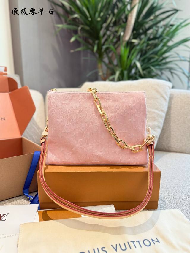 The latest addition to the collection, this Coussin PM bag features the Monogra