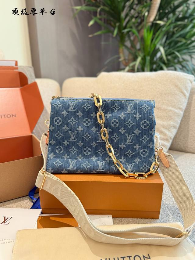 The latest addition to the collection, this Coussin PM bag features the Monogra