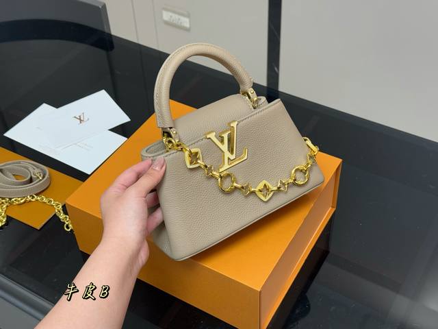 with folding box Size 21.15Cm Lv Capucines handbag Made of full-grain Taurillon