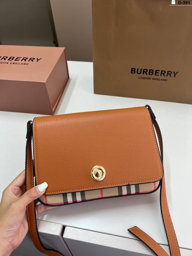 Burberry This compact crossbody bag can be worn on one shoulder, crossbody, or a