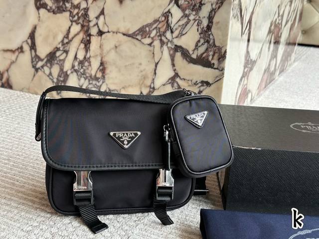 with box The relaxed feeling belongs to you Prada postman This black second-han