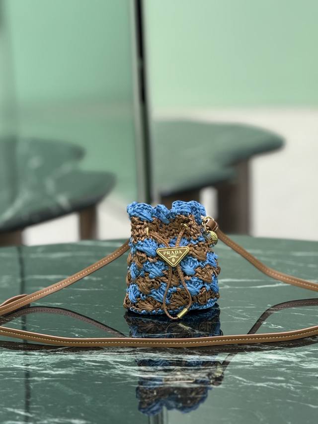 Woven Bucket This hand-woven mini bucket is so pretty! It features a colorful, e