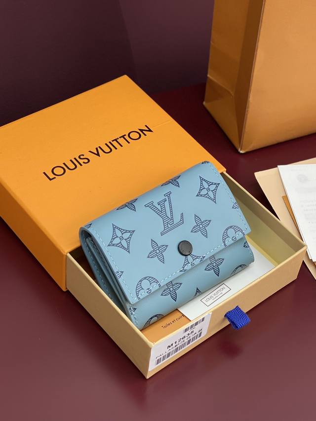 Factory Price: P M12635 New embossed ice blue! This compact Victor wallet is cra