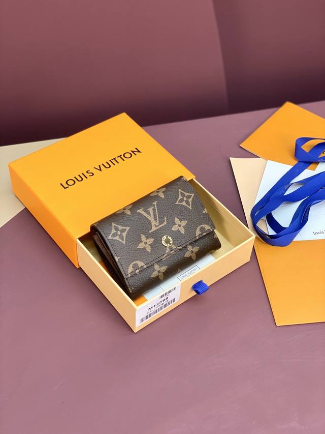 Factory Price P M12598 Monogram! This elegant Victor wallet, crafted from Monogr