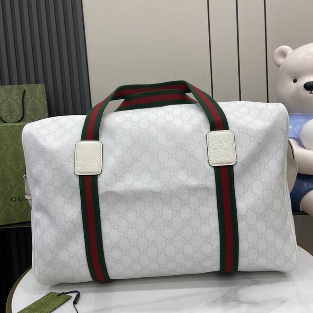 comes with a full set of original green gift bags. New Gg large travel bag. Sinc